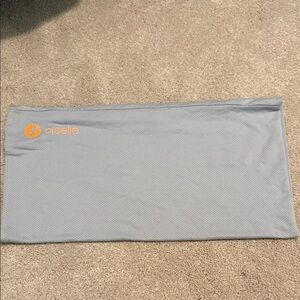 Oiselle Light Gray and Bright Orange neck buff